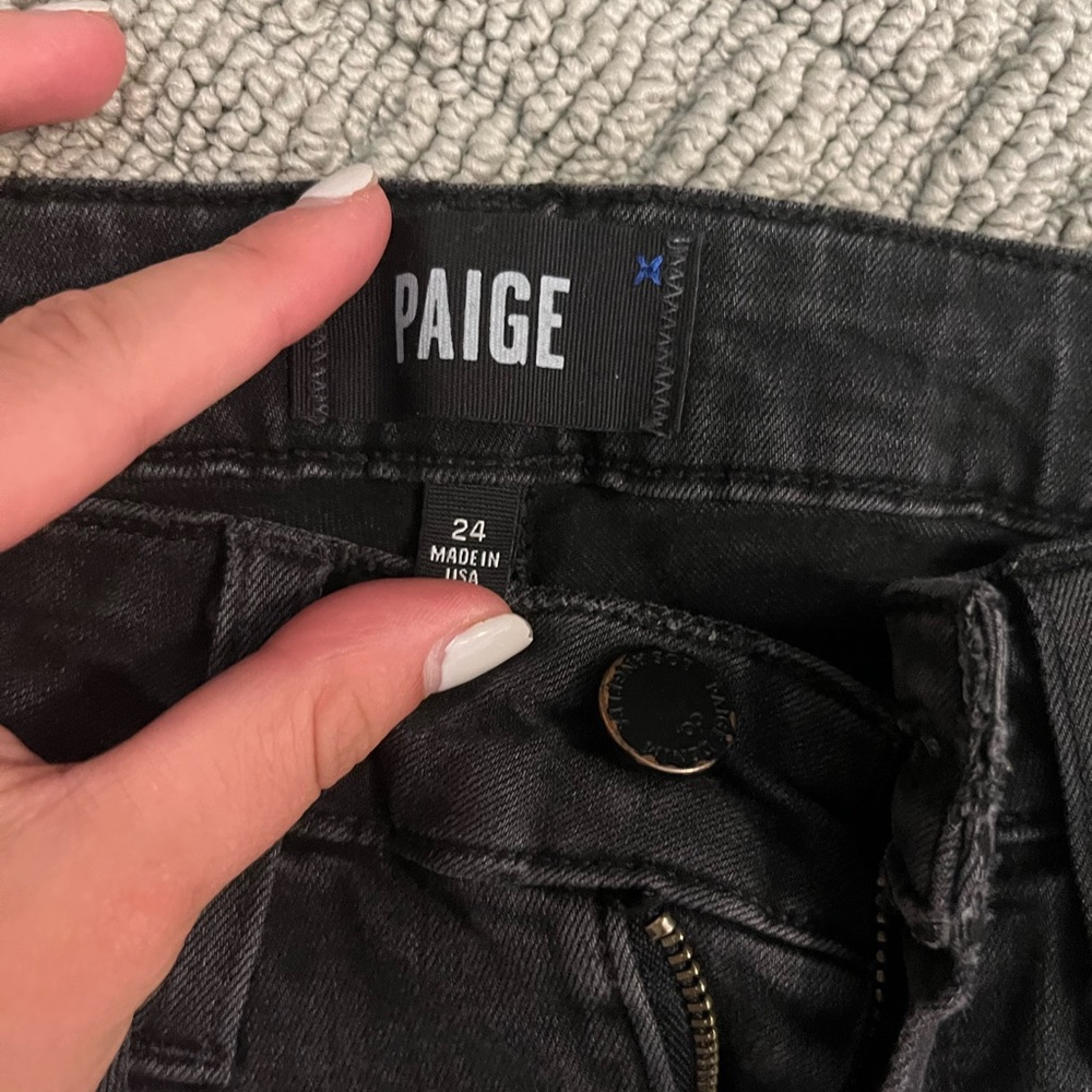 Paige size 24 black jeans with zipper on sides.